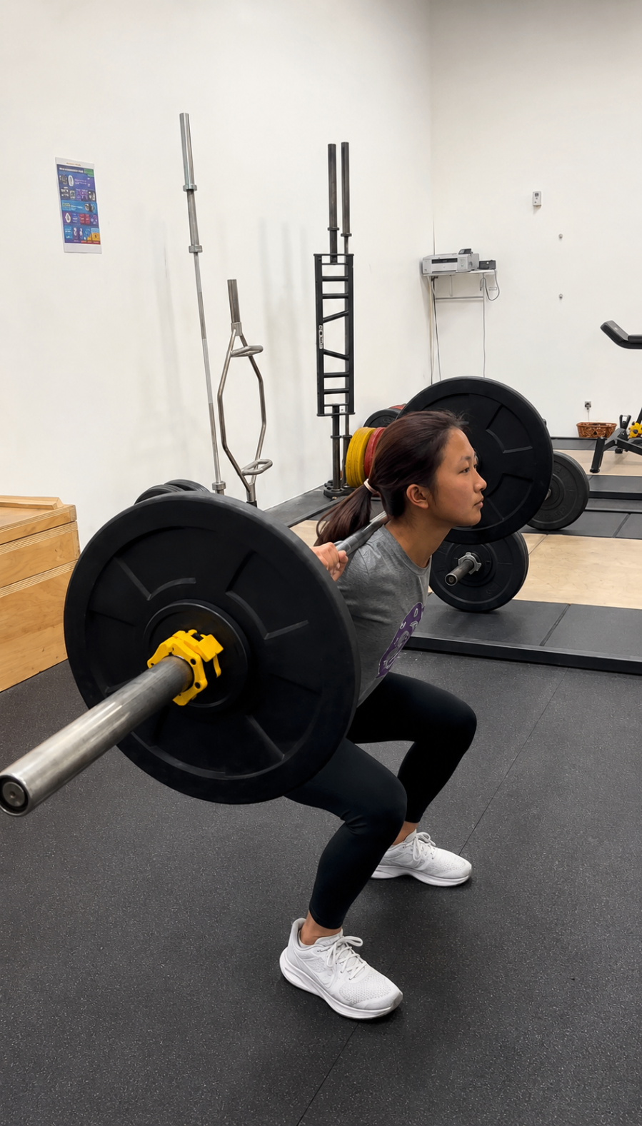 Athlete performing a barbell back squat for explosive strength and athletic development